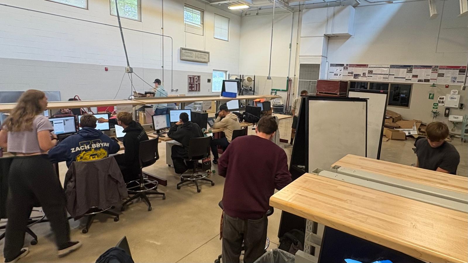 Power Unit and Drivetrain members at CAD workstations